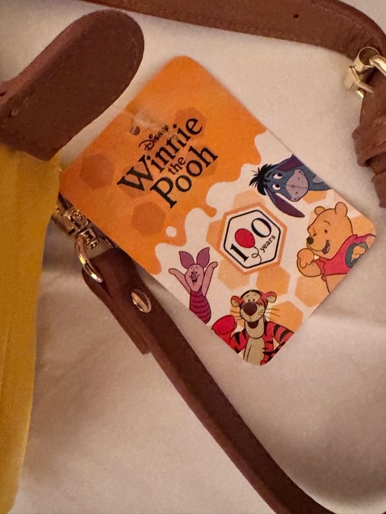 New Disney Yellow & Brown Mini Winnie the Pooh Crossbody Bag w/Bag Charm - Picture 6 of 8